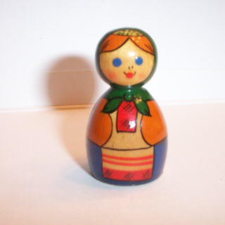 AJ76. Small Brest Solid Doll in Rust & Green 2.5"