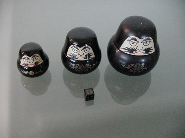 DC16. Japanese Dolls With Dice - Black