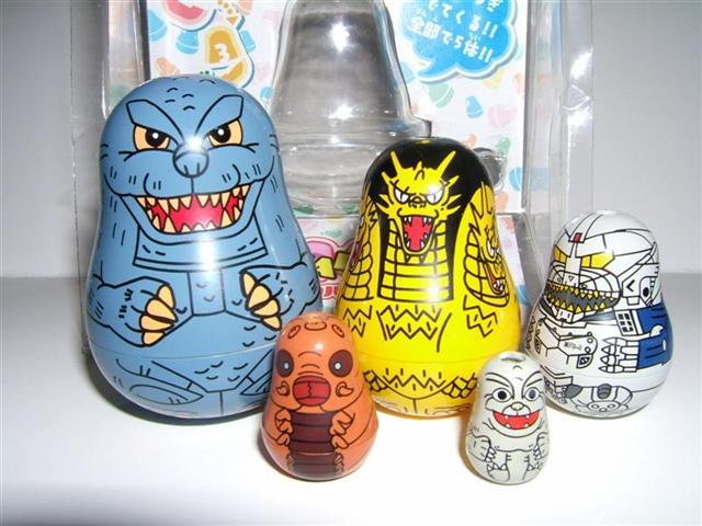 DC27. Plastic Godzilla Nesting Figures 2.5" 4n