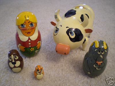 HG16. Nesting Cow and Milkmaid 7” 5n