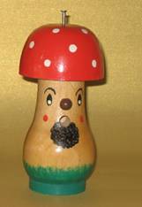 PB33. Unusual Mushroom Man Bobbin 5.75”