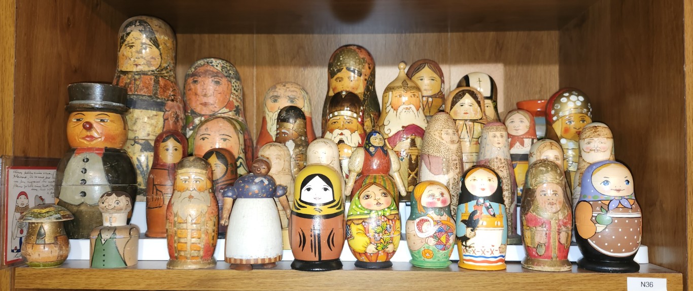 Shelf-D1. Antique dolls and replicas